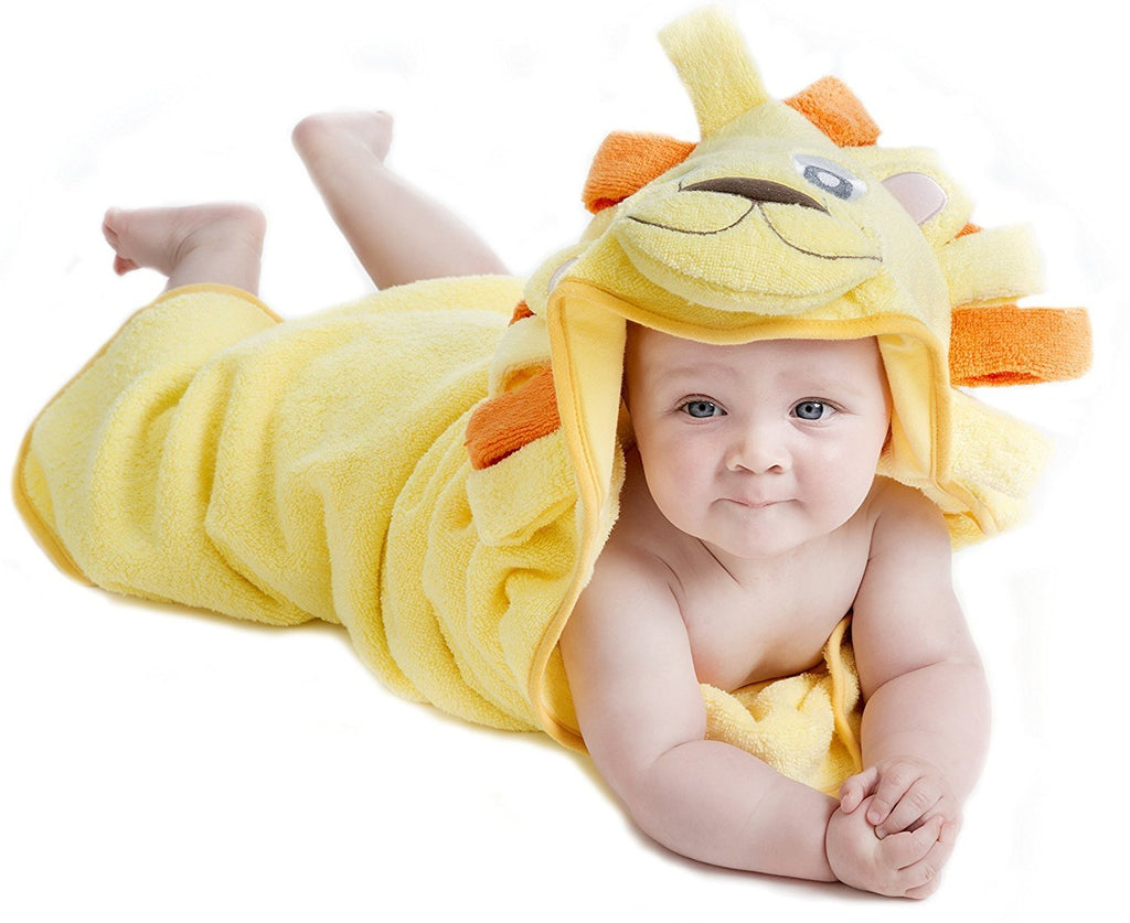 Alt = Baby lying on tummy wrapped in Lion hooded towel