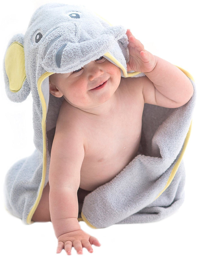 Alt = Baby facing forward wearing hooded towel with elephant hood