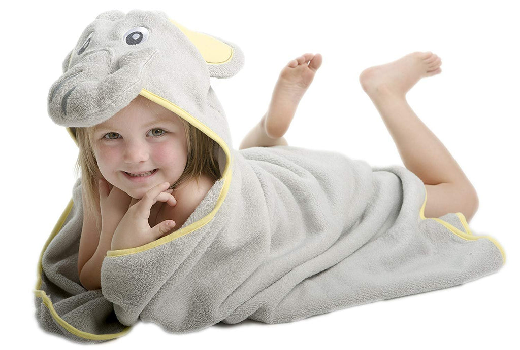 ALT = Toddler girl lying on stomach wrapped in Elephant hooded towel