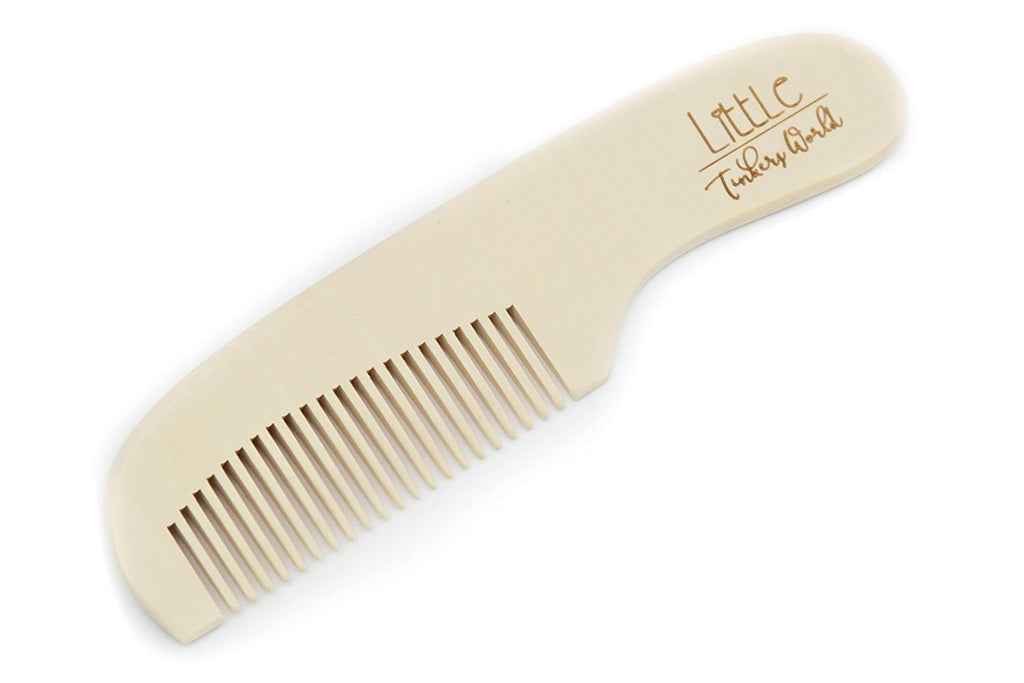 Alt= Close up of the wooden baby comb