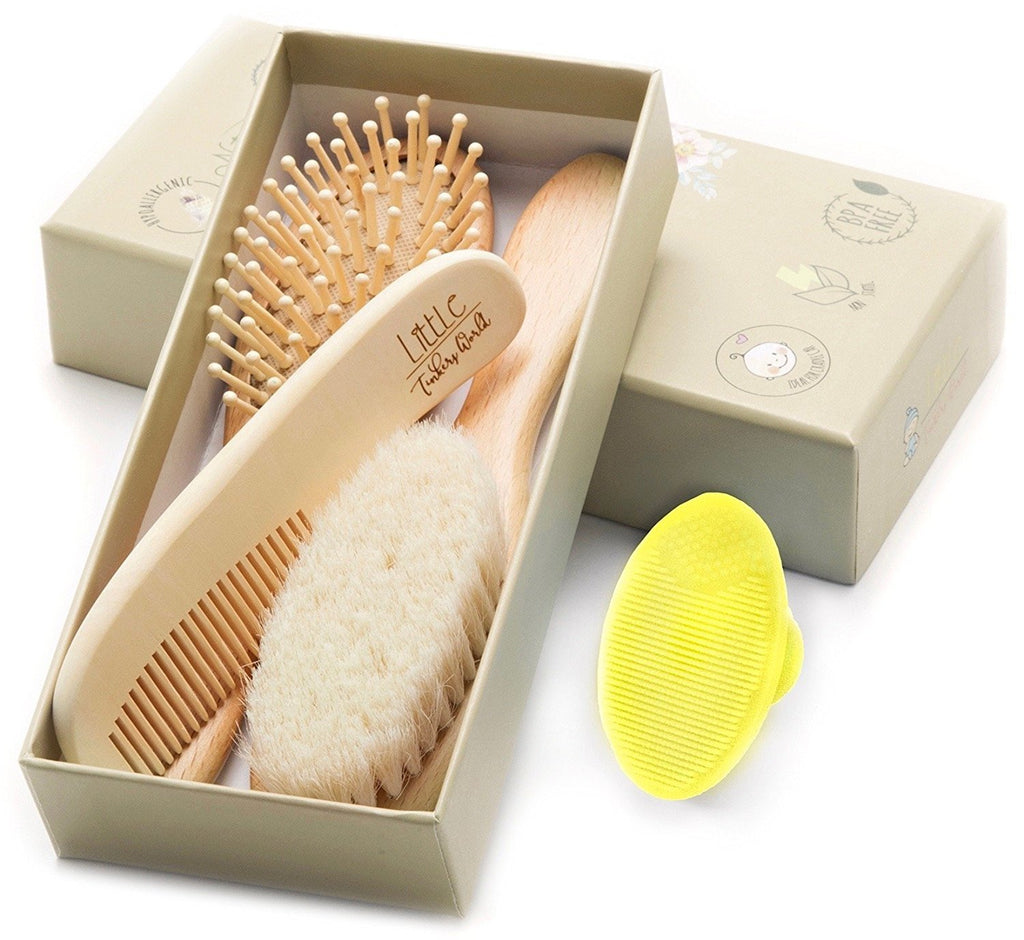 Alt = Wooden baby brush set 4 Pieces shown inside the brown box  packaging tilted up