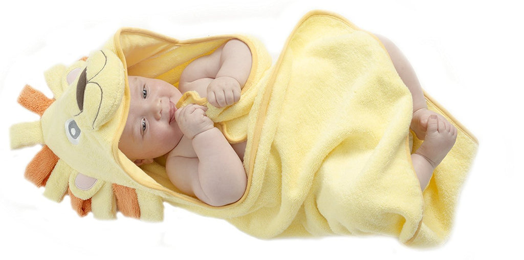 Alt = Baby lying on back wrapped in Lion hooded towel
