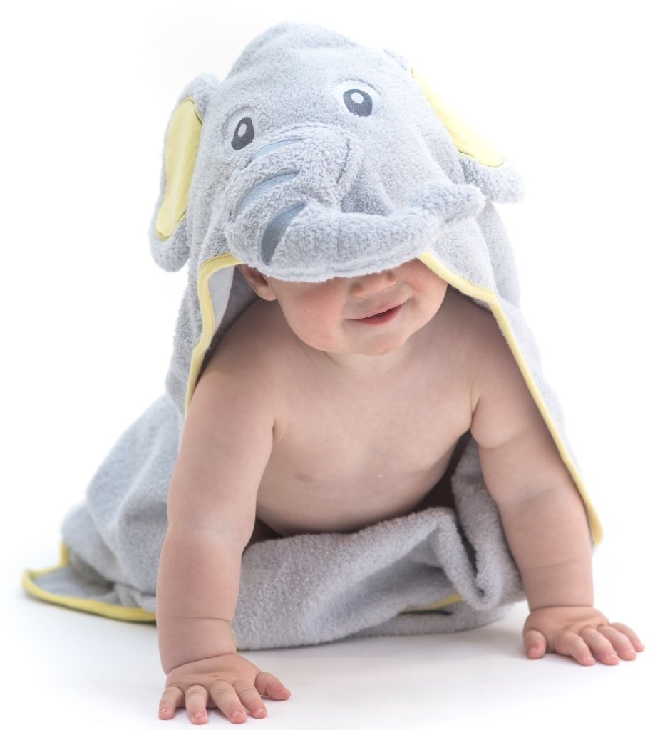 Alt = Baby facing forward wearing hooded towel with elephant hood covering face